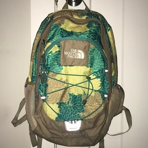multicolored northface backpack